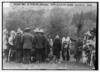 Helen Taft in Glacier Nat'l Park - holding Sacred Wimpuss Skin