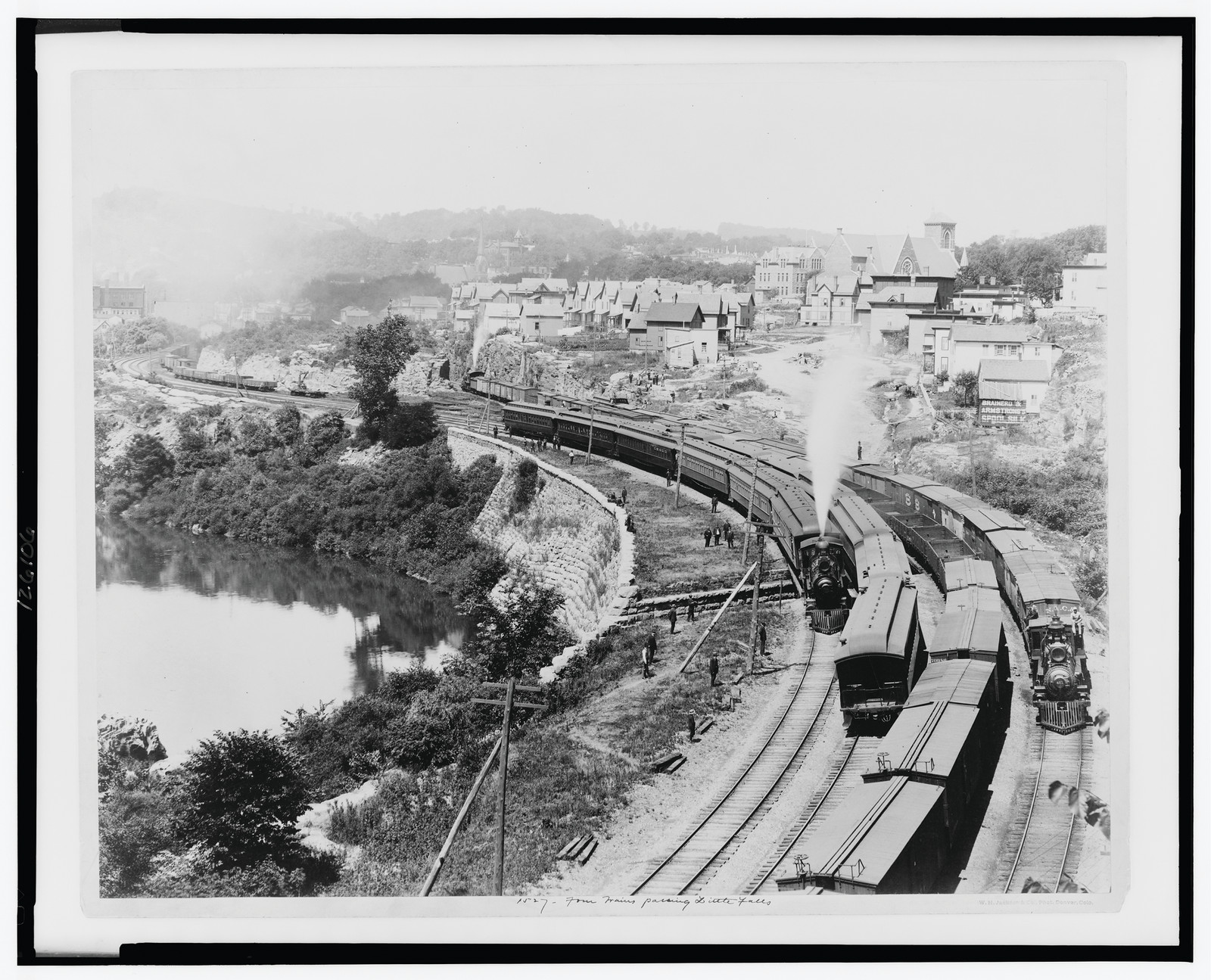 Four trains passing Little Falls, c1890. — historic photograph