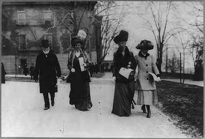 [Andrew Carnegie with his wife Louise Whitfield Carnegie, sister-in-law Estelle (Stella) Whitfield, and daughter Margaret, walking outdoors in winter]