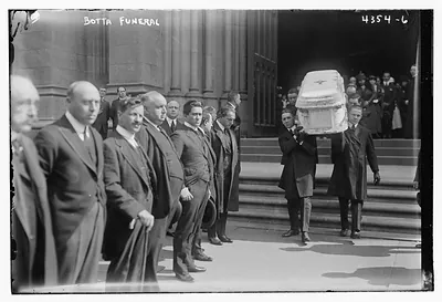 Botta funeral - carying coffin from church