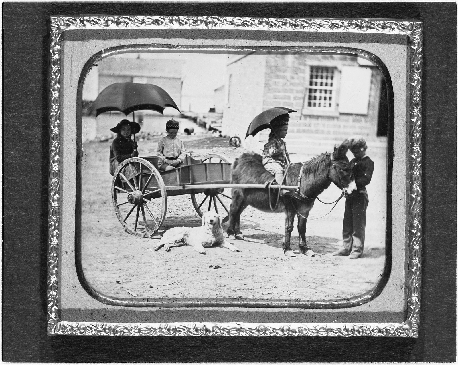 [Children of Lt. Montgomery C. Meigs, in donkey cart with dog, probably Mary Montgomery, Charles, Montgomery, and John Rodgers], [between 1850 and 1851] — historic photograph
