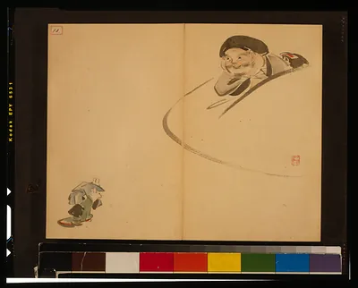 Japanese ink sketch of a reclining figure on a page