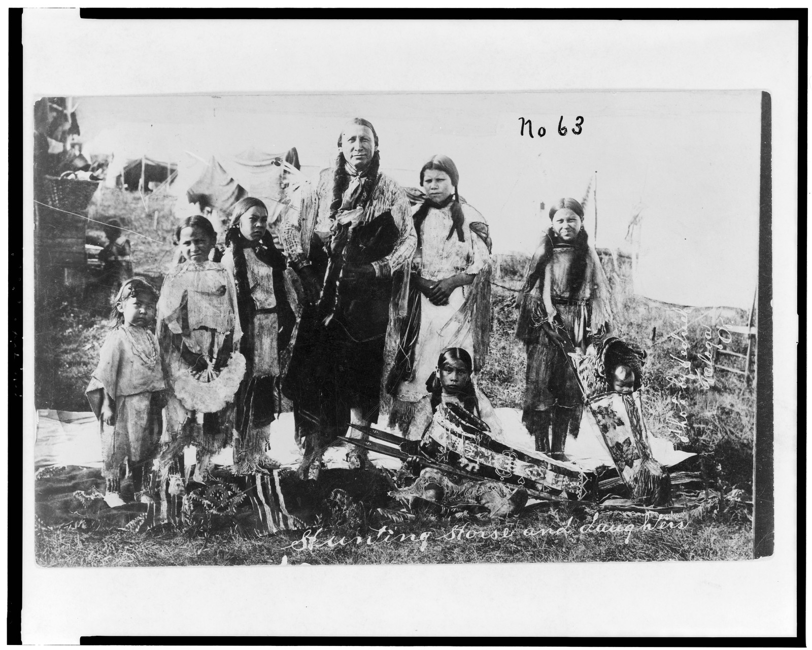 Hunting Horse and daughters / photo by Dedrick, Taloga, Ok., c1908. — historic photograph