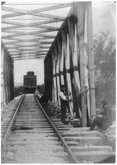 [Military railroad operations in northern Virginia: men working on bridge]