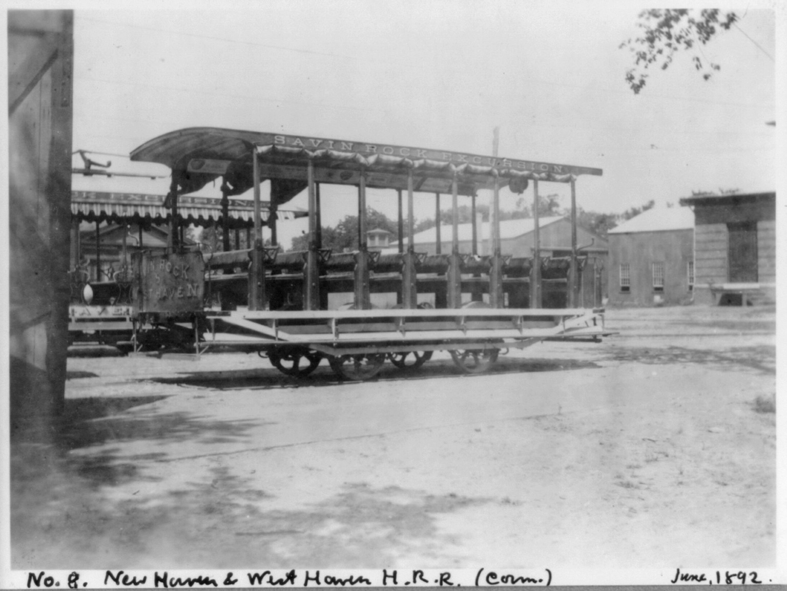 [Conn. - New Haven - horse-drawn street railways; N.H. & W.H.H.R.R. Co. cars in car barn yard: car no. 8] — historic photograph