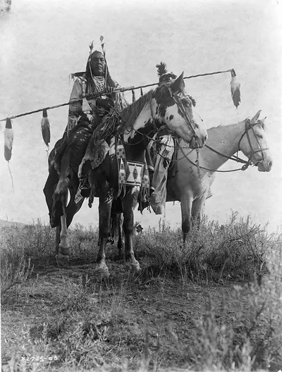 [Village criers on horseback, Bird On the Ground and Forked Iron, Crow Indians, Montana]