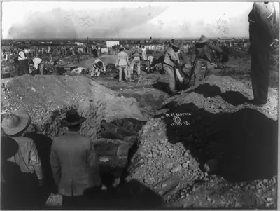 Filling the trench with dead Federals - Mexican Revolution
