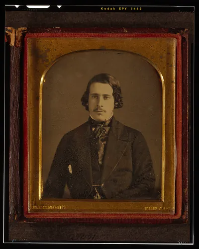 [Unidentified man, half-length portrait, seated, facing front]
