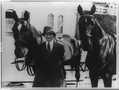 Annual Washington horse show opens at the riding and hunt club- Mary Parker Corning, daughter of Parker Corning, congressman from New York, with her two entries Joy" and "Red""