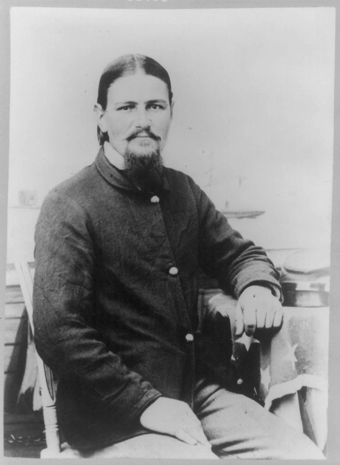 [Boston Corbett, half-length portrait, seated] — historic photograph