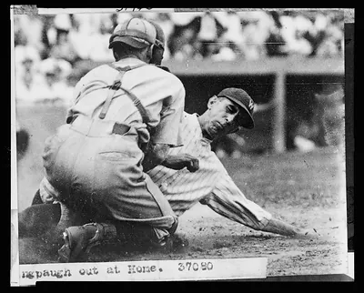 [Roger Peckinpaugh, of the Washington Nationals, tagged out at home plate during baseball game between Washington and the Philadelphia Athletics]