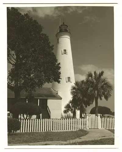 St Marks Lighthouse with palms and picket fence