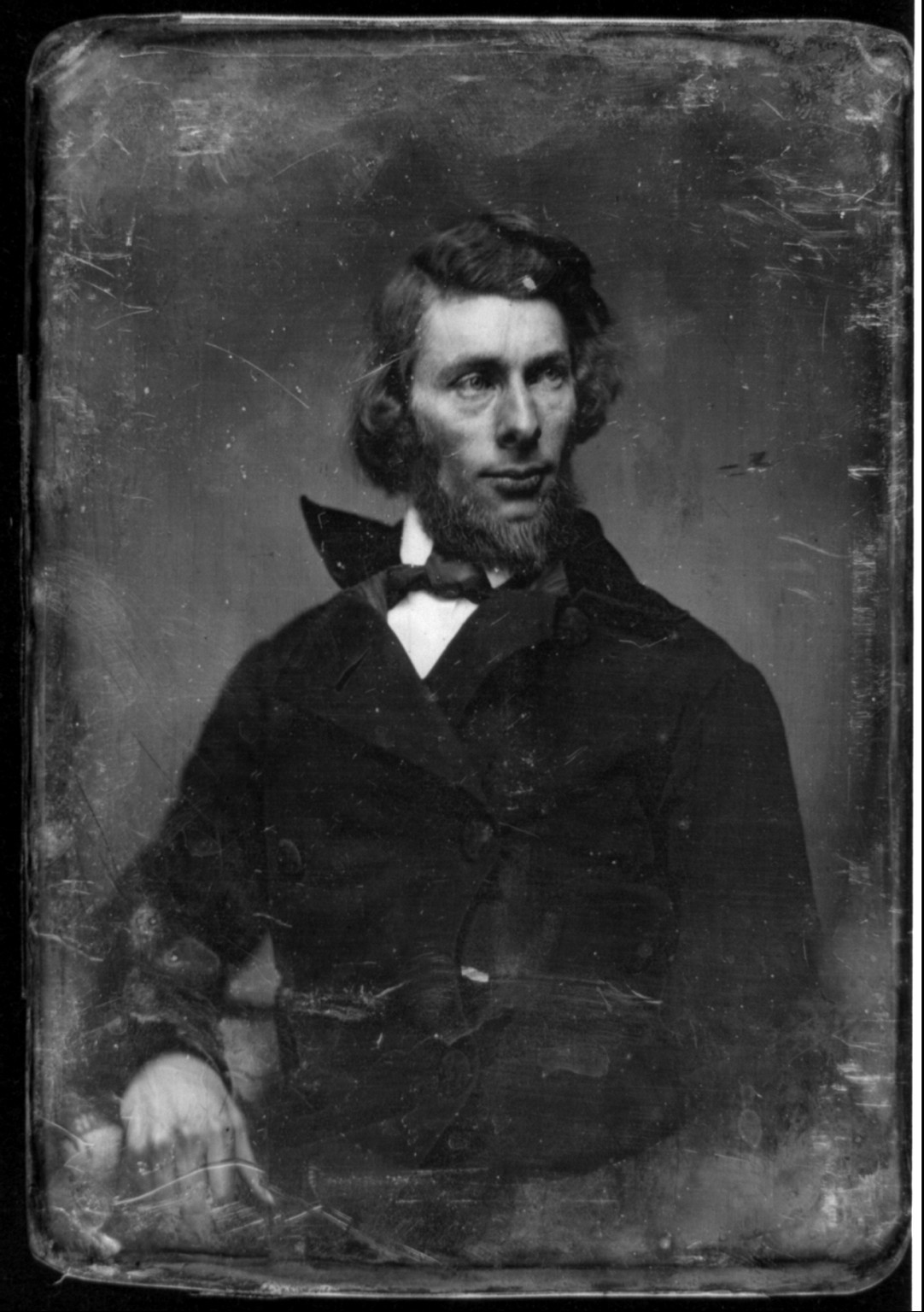 Bearded man in dark coat, daguerreotype portrait, 1844 — historic photograph