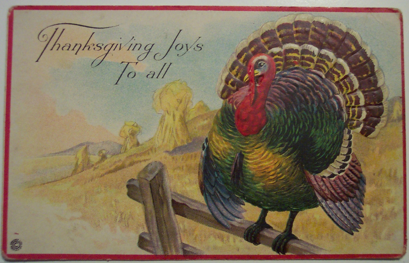 Thanksgiving Joys To All postcard with turkey on fence — vintage postcard