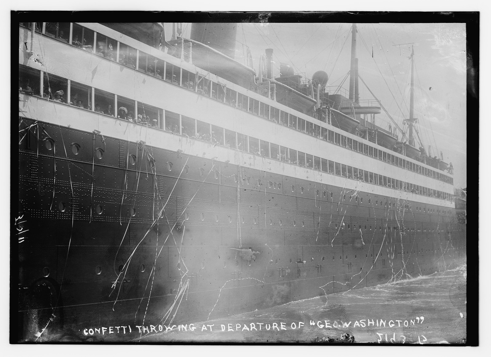 Confetti throwing at the departure of the George Washington, n/a — historic photograph