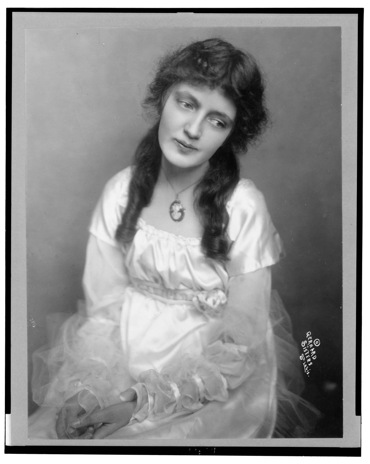 [Mary Kean, half-length portrait, seated, facing front with head tilted to the right] / Gerhard Sisters, St. Louis., c1915 April 23. — historic photograph