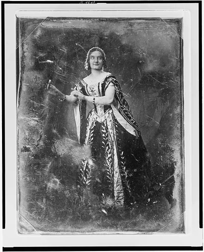 [Teresa Truffi, full-length portrait of a woman, slightly to the left, eyes right, standing, in theatrical costume, holding small bottle]