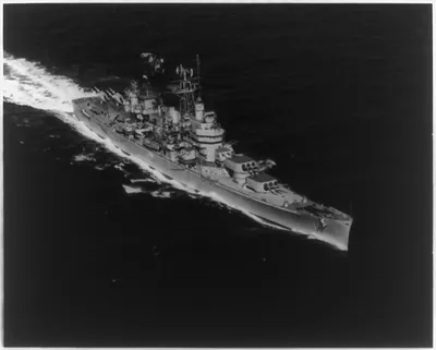 Starboard bow view of the USS BOSTON (CAG-1), the Navy's first guided missile cruiser, underway off Guantanamo Bay, Cuba