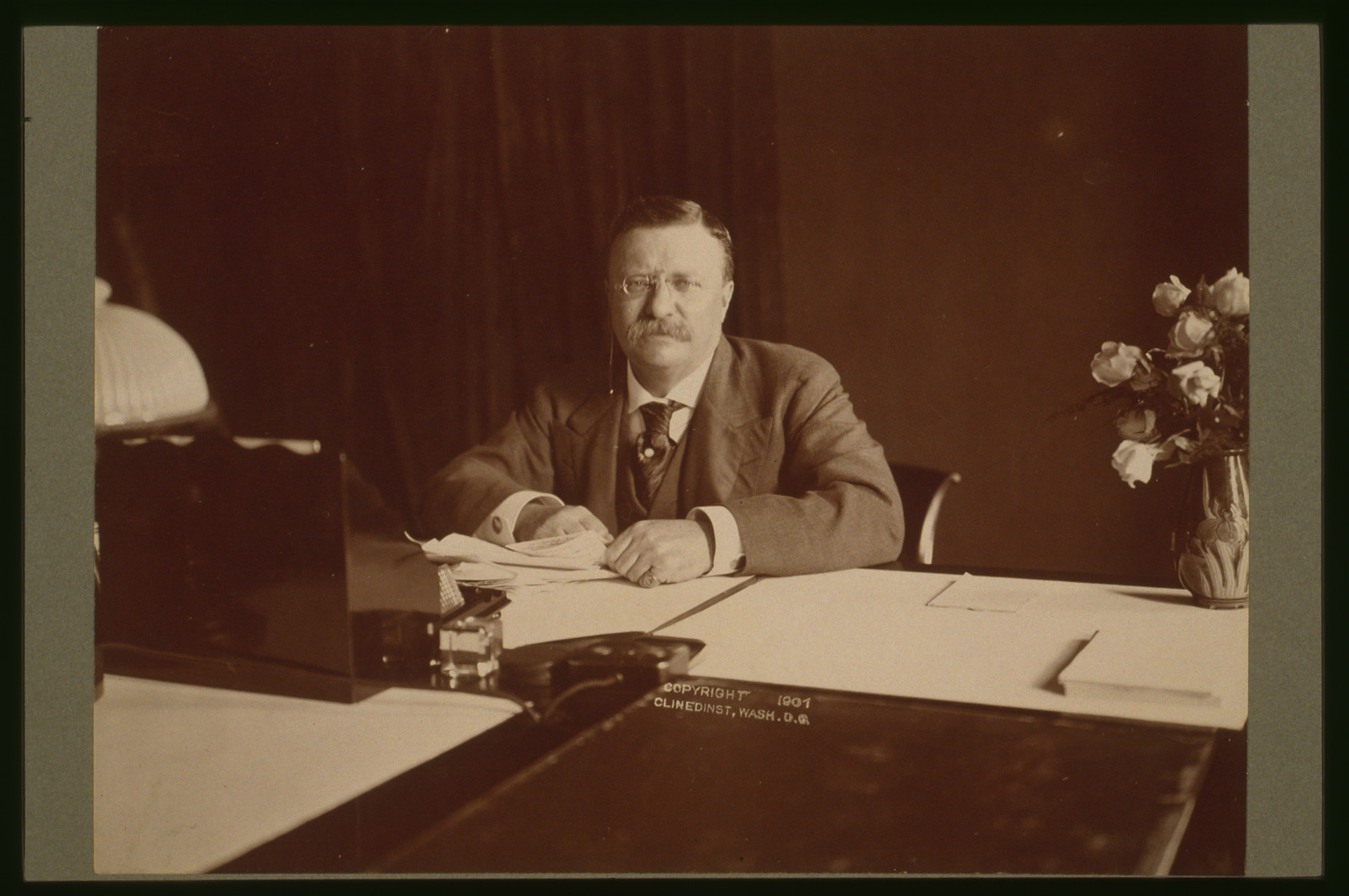 [Theodore Roosevelt, head-and-shoulders portrait, seated at desk, facing front], c1907 May 27. — historic photograph