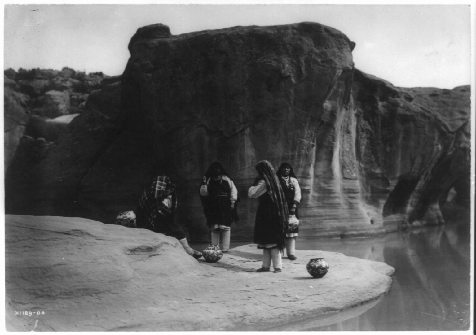 A morning chat--Acoma, c1905. — historic photograph