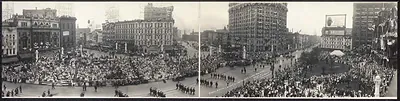 Panoramic photograph of a crowded city parade, Detroit-style street