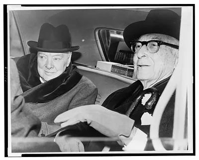 Churchill & Baruch talk in car in front of Baruch's home / World Telegram & Sun photo by Ed. Ford.