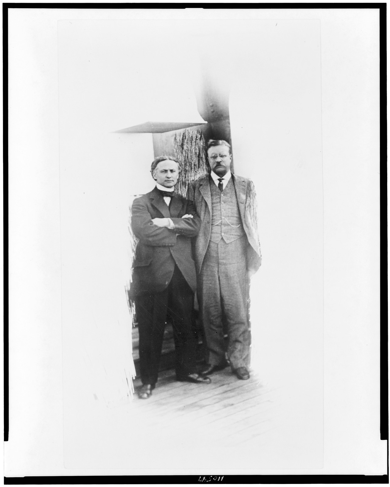 [Harry Houdini, standing alongside of Theodore Roosevelt, on S.S. Imperator(?), full-length], [1914] — historic photograph
