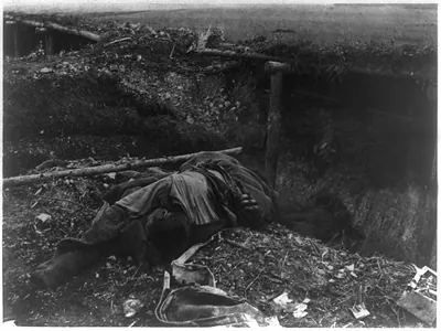 [Austro-Hungarian troops fighting in Balkans, 1916: dead soldier in front-line trench]