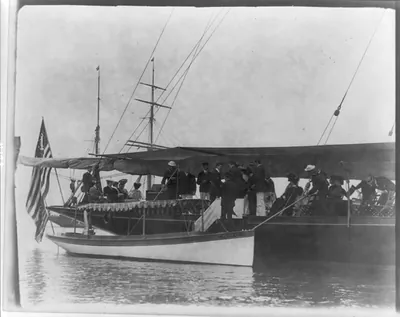 [Presidential yacht at Oyster Bay, L.I., 1905: guests boarding from launch]