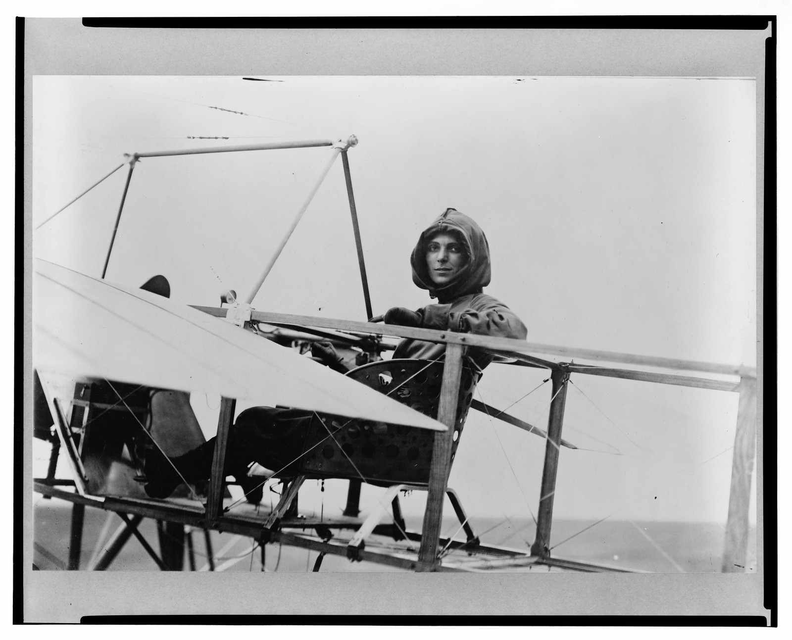 Harriet Quimby in cockpit of plane, 1911 — historic photograph