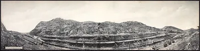 Panoramic photograph of Culebra Cut excavation with railway tracks