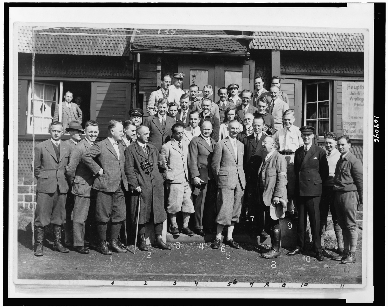 [Group of prominent members of aeronautic organizations posed, full-length, in Germany, at the Rhön-Segelflug-Wettbewerb], 1930 — historic photograph