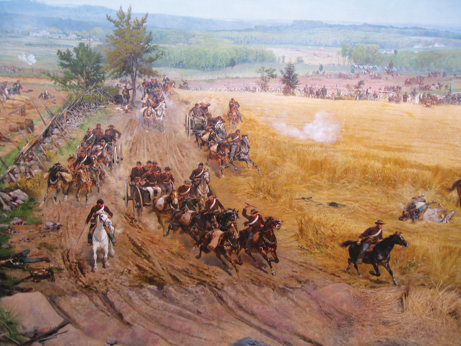 Painted Civil War artillery and cavalry charge across a wheat field — historic image