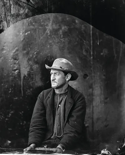 Edman Spangler, A "Conspirator," In Hat And Manacled, Washington Navy Yard, D.C. Alexander Gardner, photographer