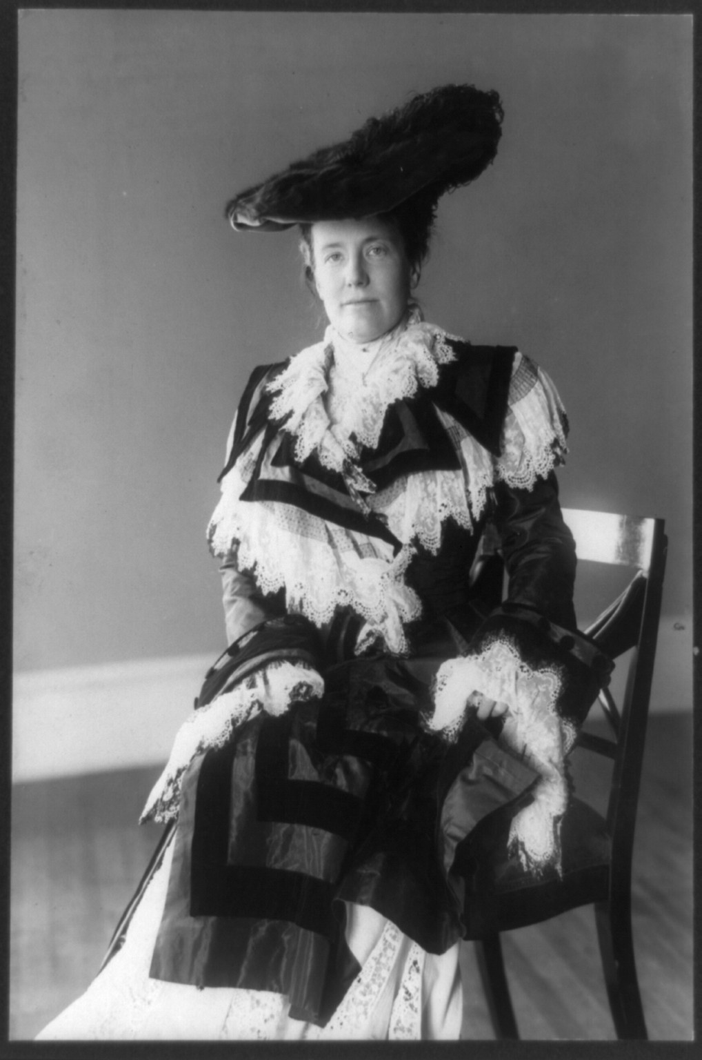 [Edith Kermit Carow Roosevelt, three-quarter length portrait, seated, facing left] / Frances B. Johnston., c1903. — historic photograph