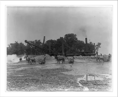 [World's Columbian Exposition, Chicago, under construction: Huge dredging machine, mules, etc.]