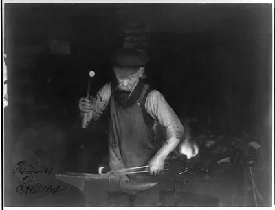 [Blacksmith at work]