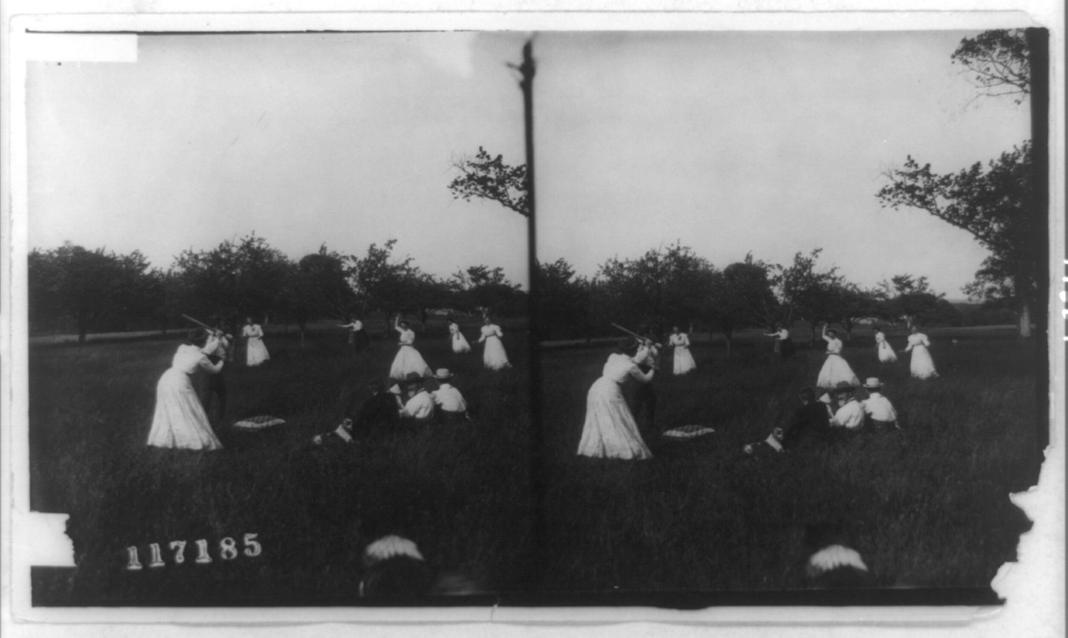 [Men and women playing baseball], c1910. — historic photograph