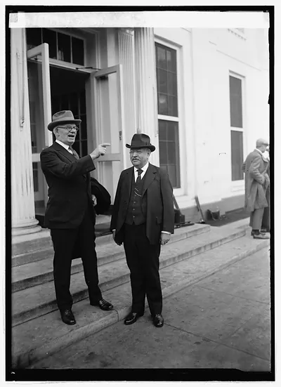 Rep. M.B. Madden of ILL. and Frank Stearns at W.H. [i.e. White House, Washington, D.C.],