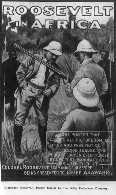[Theodore Roosevelt, Pres. U.S., 1858-1919. Roosevelt in Africa...examining gun before being presented to Chief Akawahki" - poster adv. for Selig film "Hunting big game in Africa" 1910]"