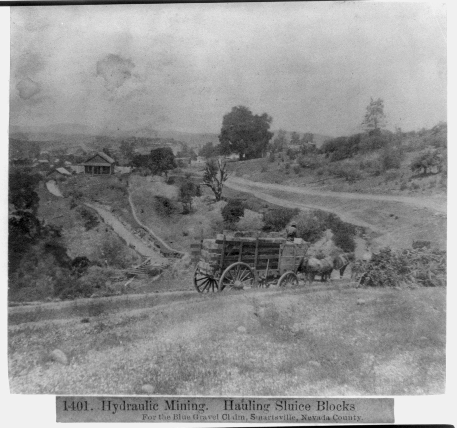 Hydraulic Mining - hauling Sluice Blocks, for the Blue Gravel Claim, Smartsville, Nevada County, [published 1866] — historic photograph