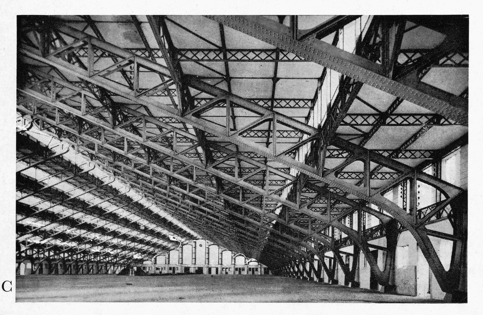 Steel-trussed interior of a large market hall — historic image