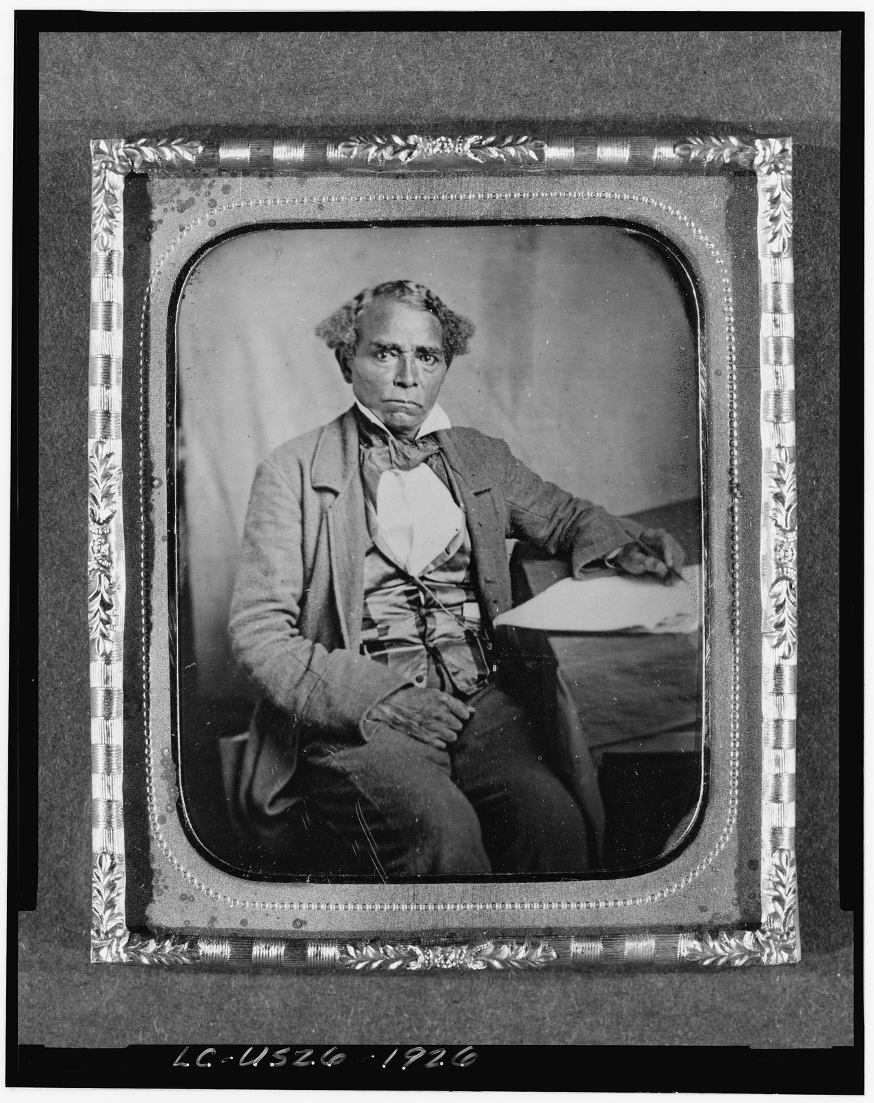 [Edward Morris, three-quarter length portrait, full face, seated at desk], [between 1856 and 1860] — historic photograph