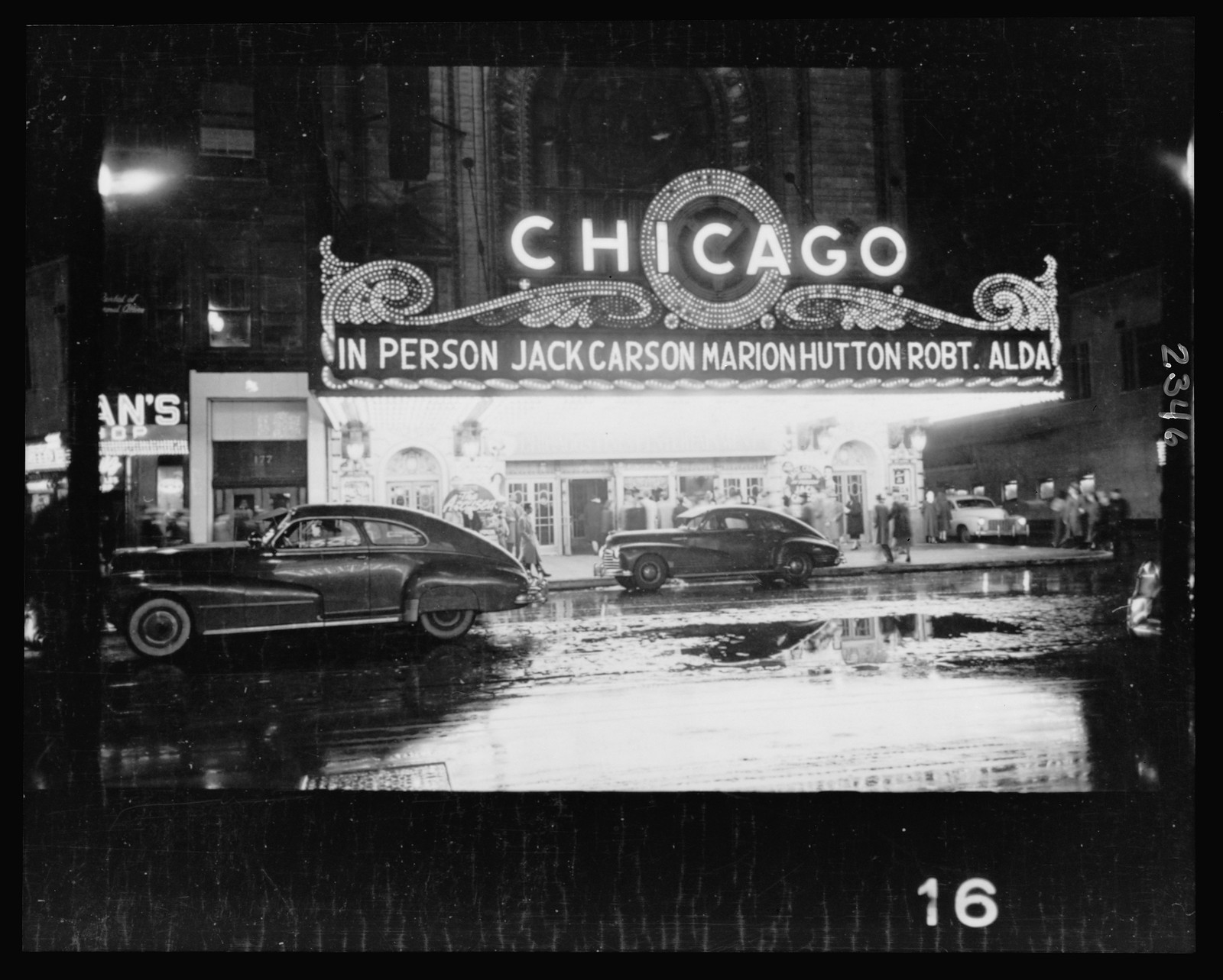 [People arriving at a Chicago theater for show starring, in person, Jack Carson, Marion Hutton, and Robert Alda] — historic photograph