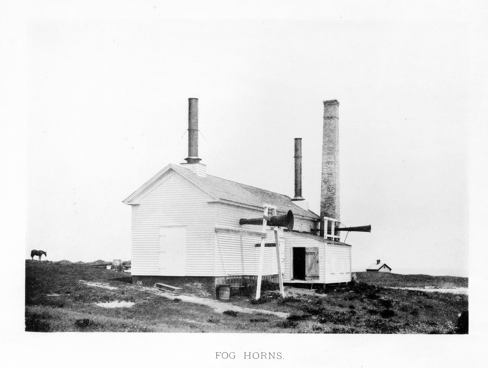 Fog Horns: white fog signal building with chimneys and horns — historic image