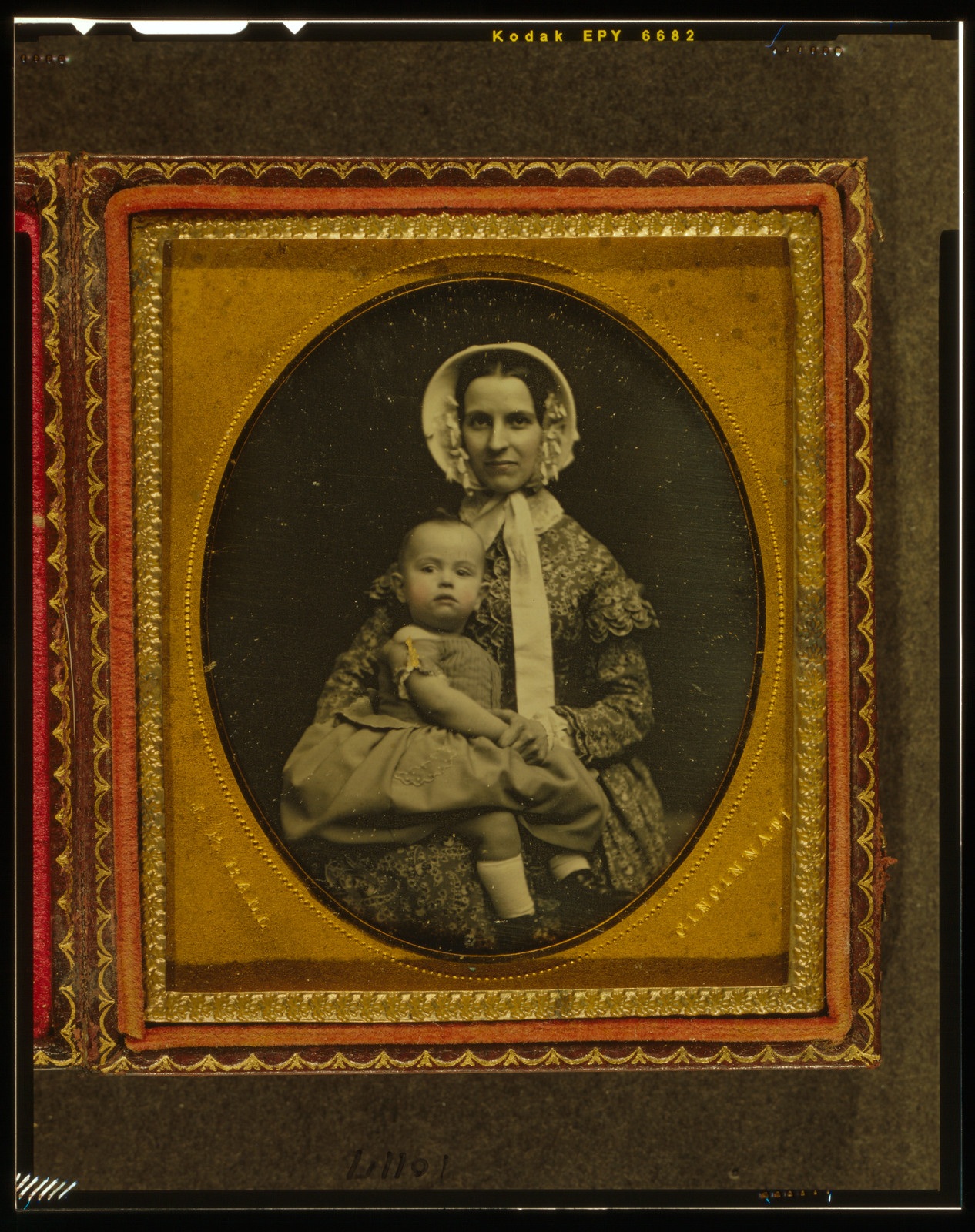 [Unidentified woman holding child in her lap], [between 1847 and 1860] — historic photograph