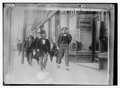 Harvard fraternity men doing stunts