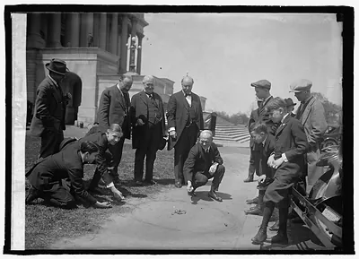 Fess playing marbles, [4/26/24]