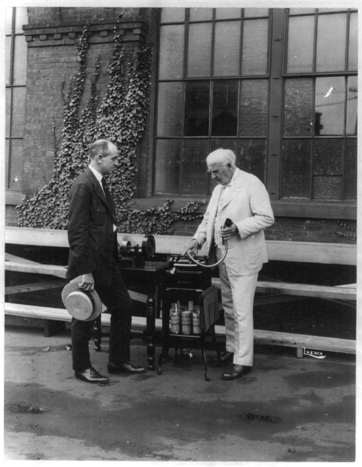 Thomas A. Edison with his dictating machine, and A.A. bratton., c1921. — historic photograph