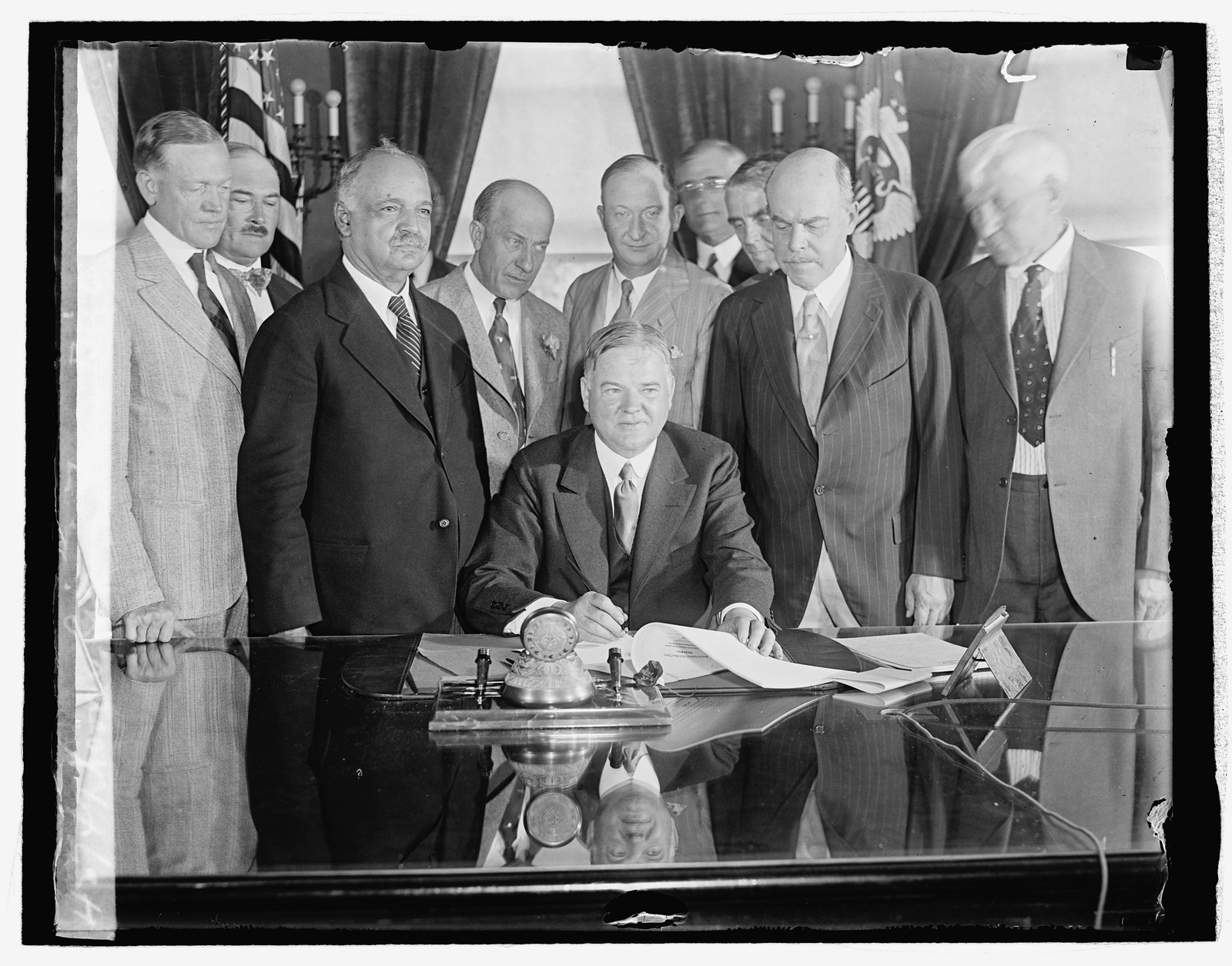 Hoover signing Fam. Bill, [1929] — historic photograph
